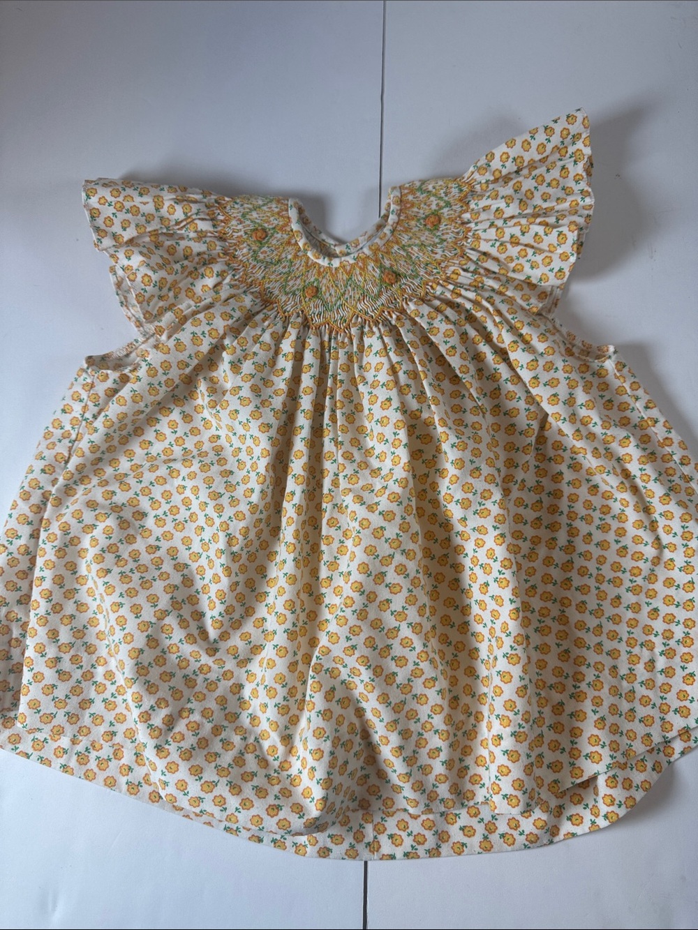Remember hguyen White and Yellow Floral Smocked Flutter dress
